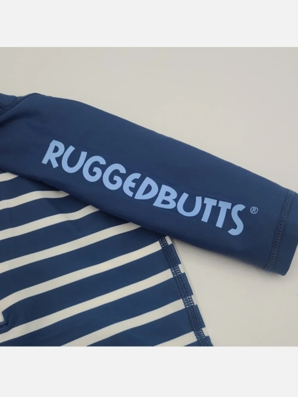 NEW RuggedButts long-sleeved rashguard swimsuit size 3-6 months